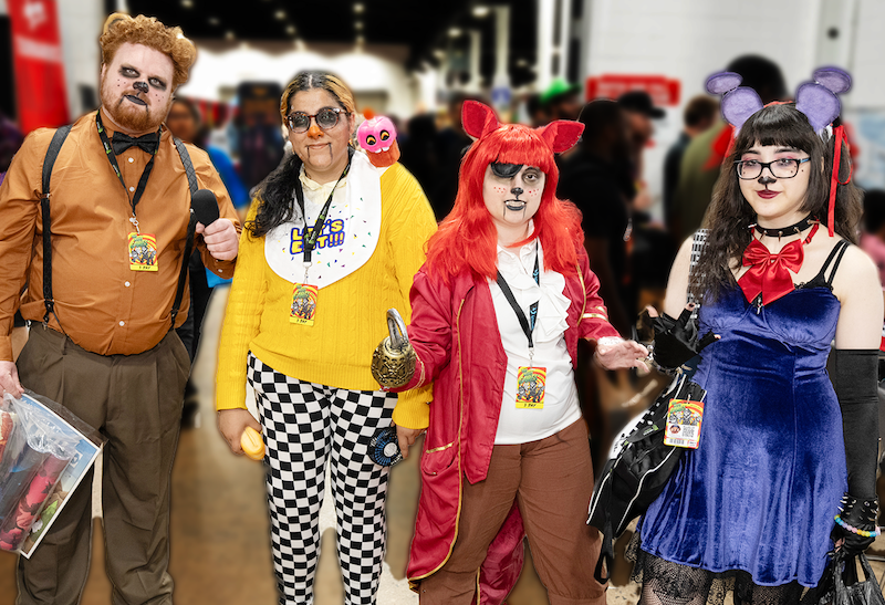 Cosplay participants posing in elaborate costumes at TooManyGames.