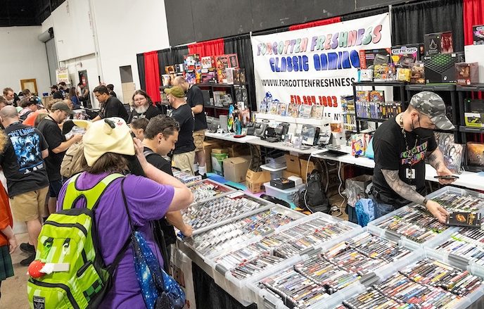 Marketplace Image to Do 1 Marketplace area at TooManyGames showcasing vendors and merchandise