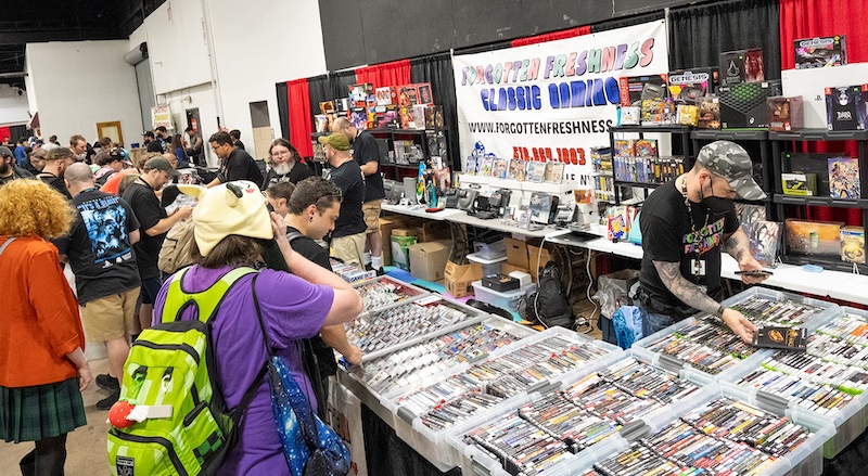 Marketplace area at TooManyGames showcasing vendors and merchandise