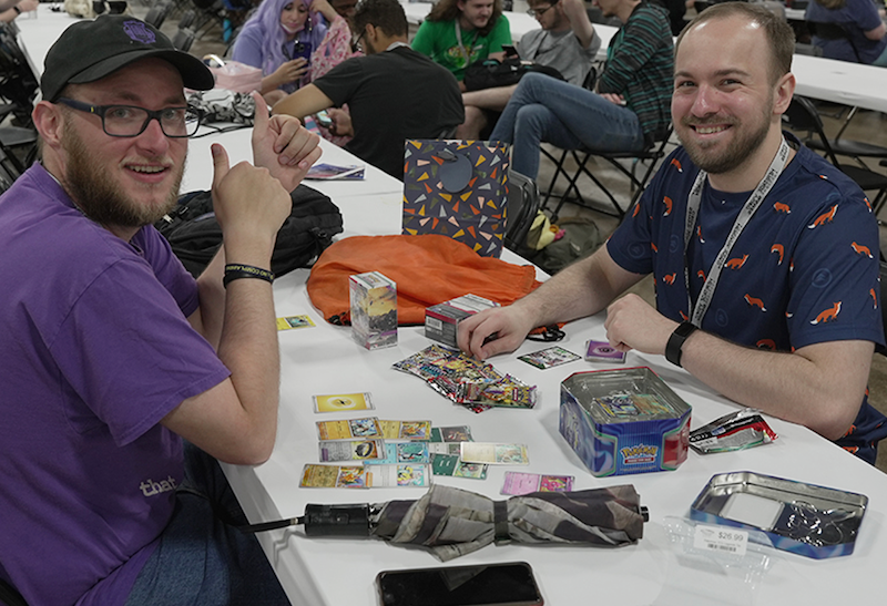 Tabletop gaming section at TooManyGames, featuring players and game boards.